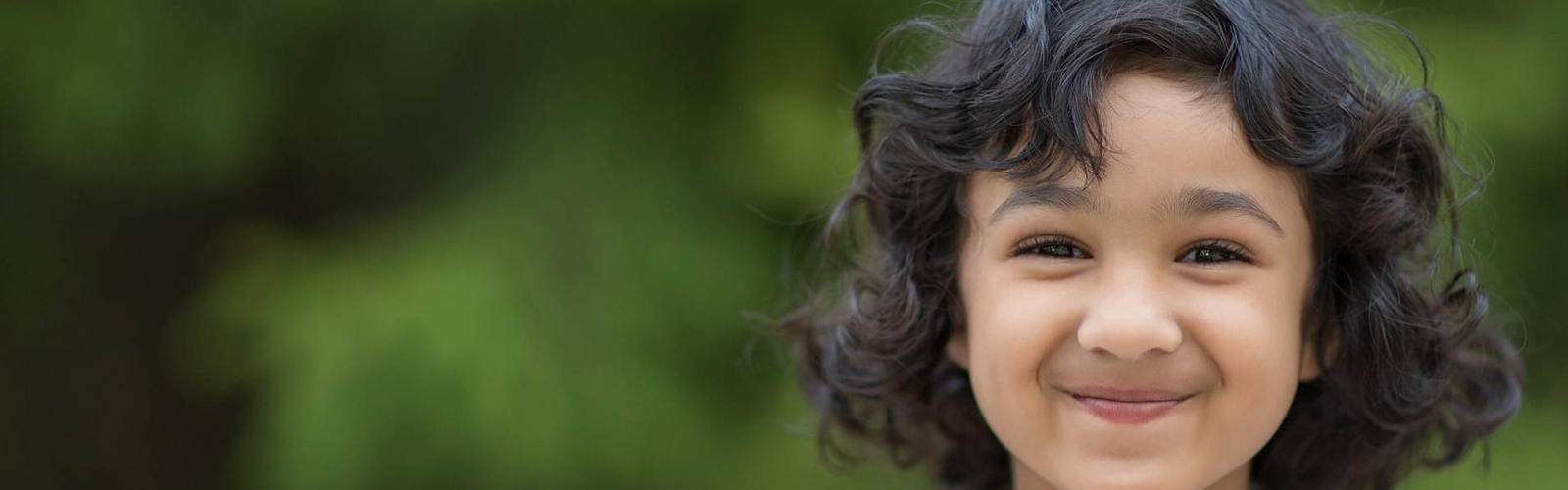 Girl Smiling - Hendersonville Community Childcare Services
