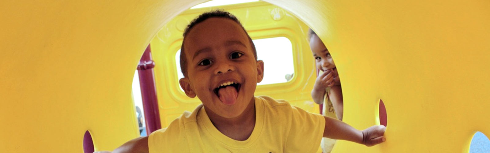 Child playing in playground - Community Child Care Service